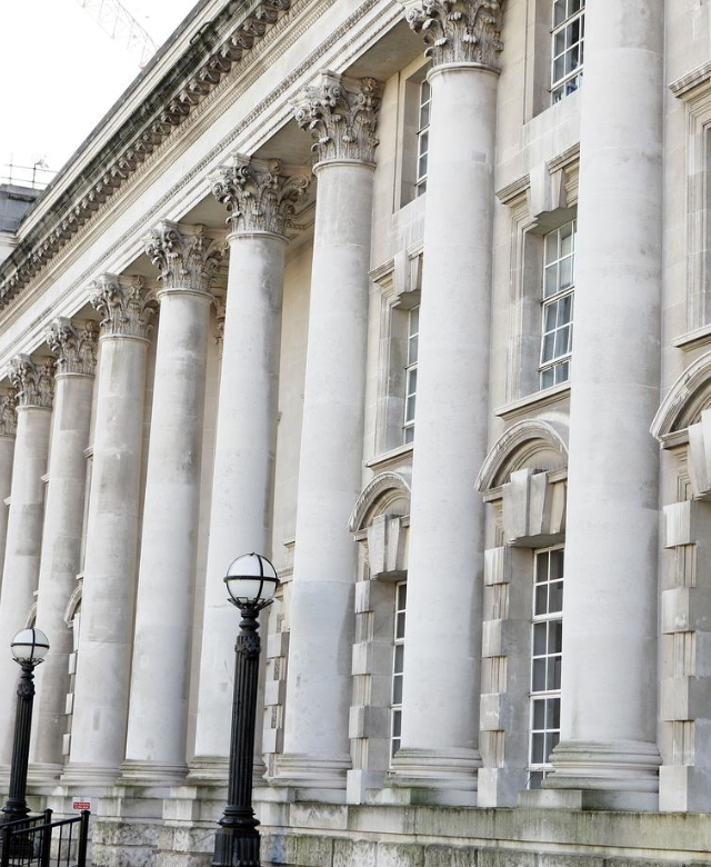 A medico-legal cardiology report with ECG traces and imaging records prepared for a Belfast-based case under Northern Ireland civil procedure.