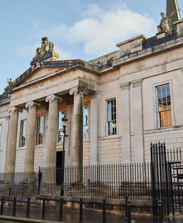 A medico-legal cardiology report with ECG traces and imaging records prepared for a Derry-based case under Northern Ireland civil procedure.