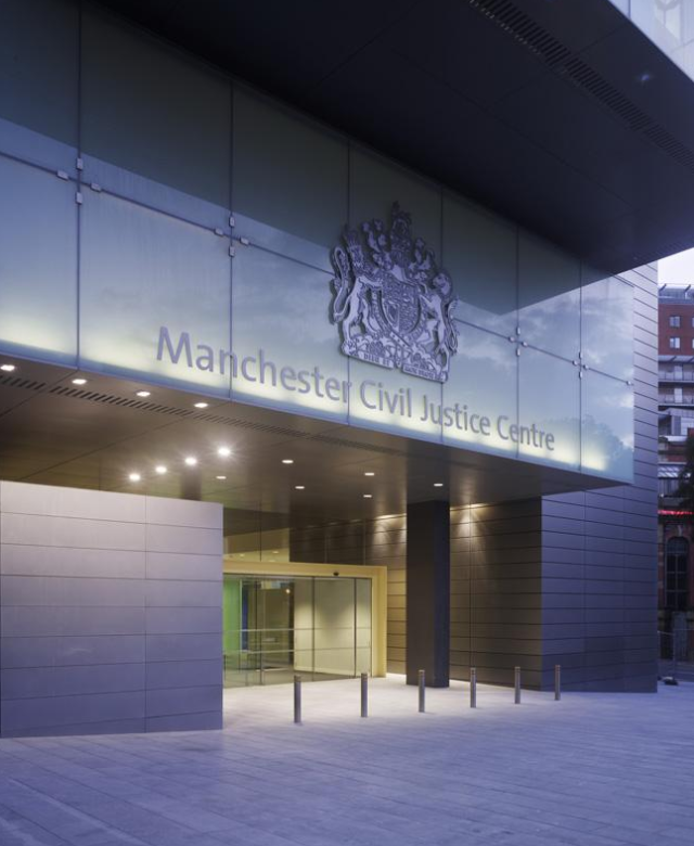 A medico-legal cardiology report, featuring ECG traces and angiogram images, rests on a UK solicitor’s desk in Manchester, highlighting CPR Part 35-compliant documentation.