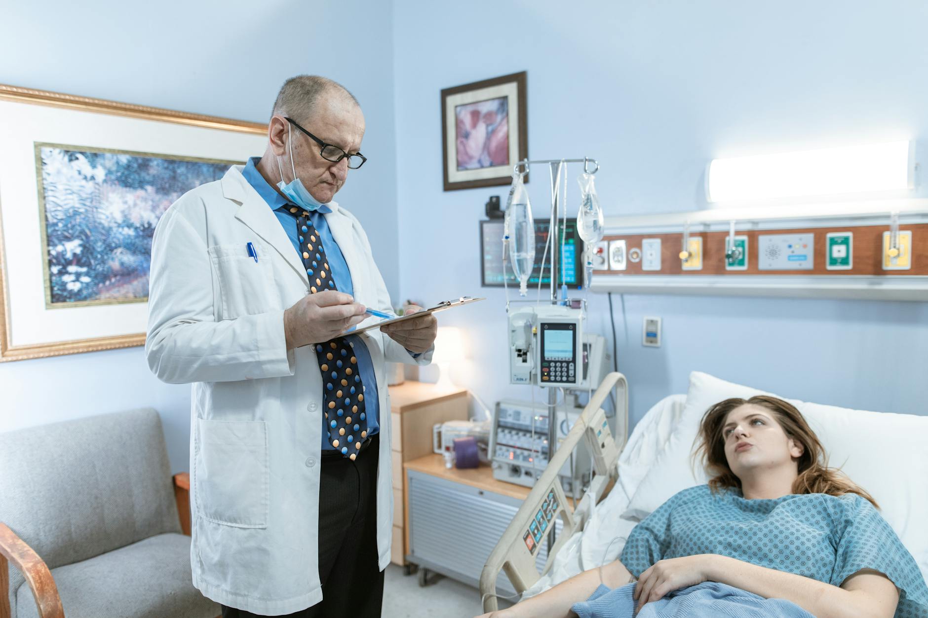 Consultant cardiologist reviewing cardiac imaging for a causation report