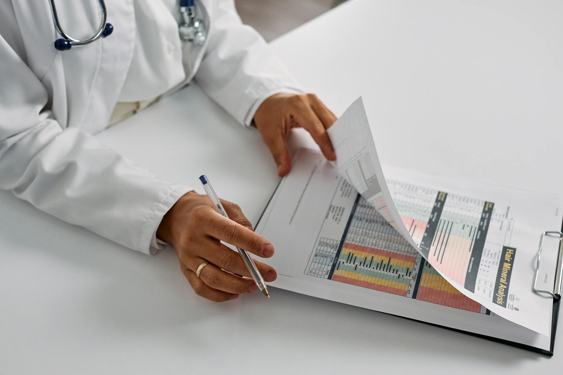 Consultant cardiologist reviewing cardiac medico-legal records