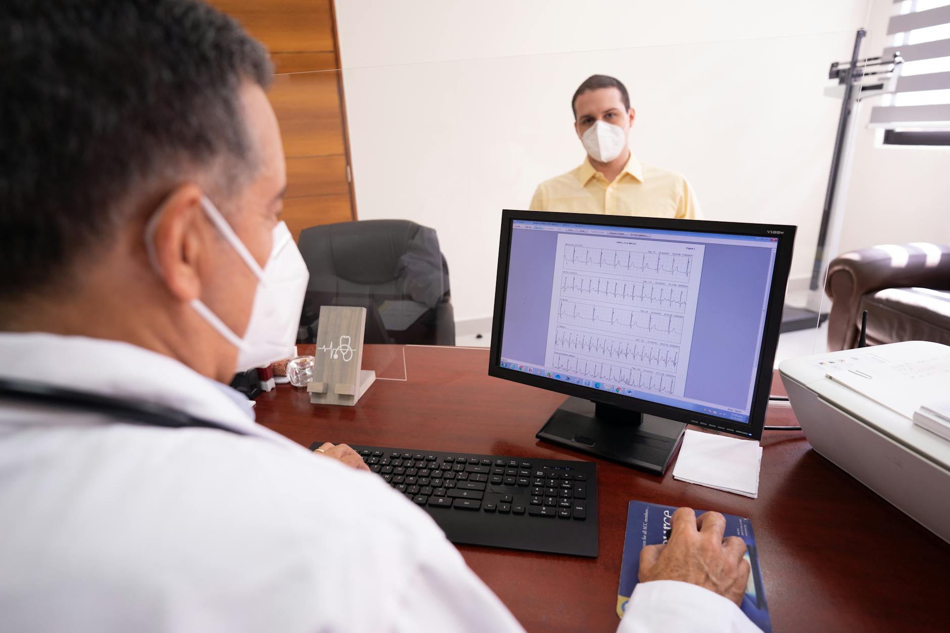 Cardiology condition and prognosis report on a desk with stethoscope