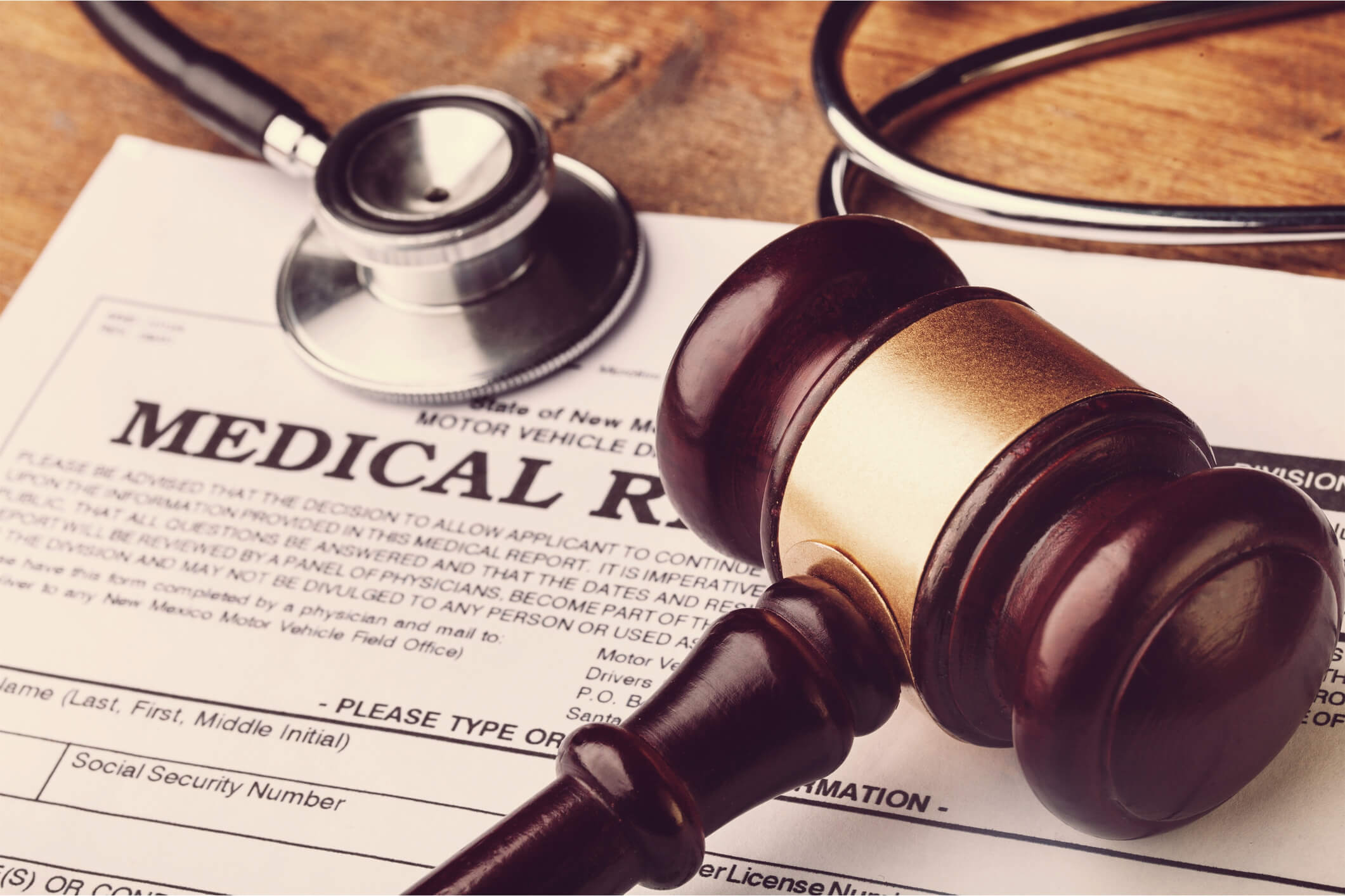 Consultant cardiologist preparing a medico-legal report