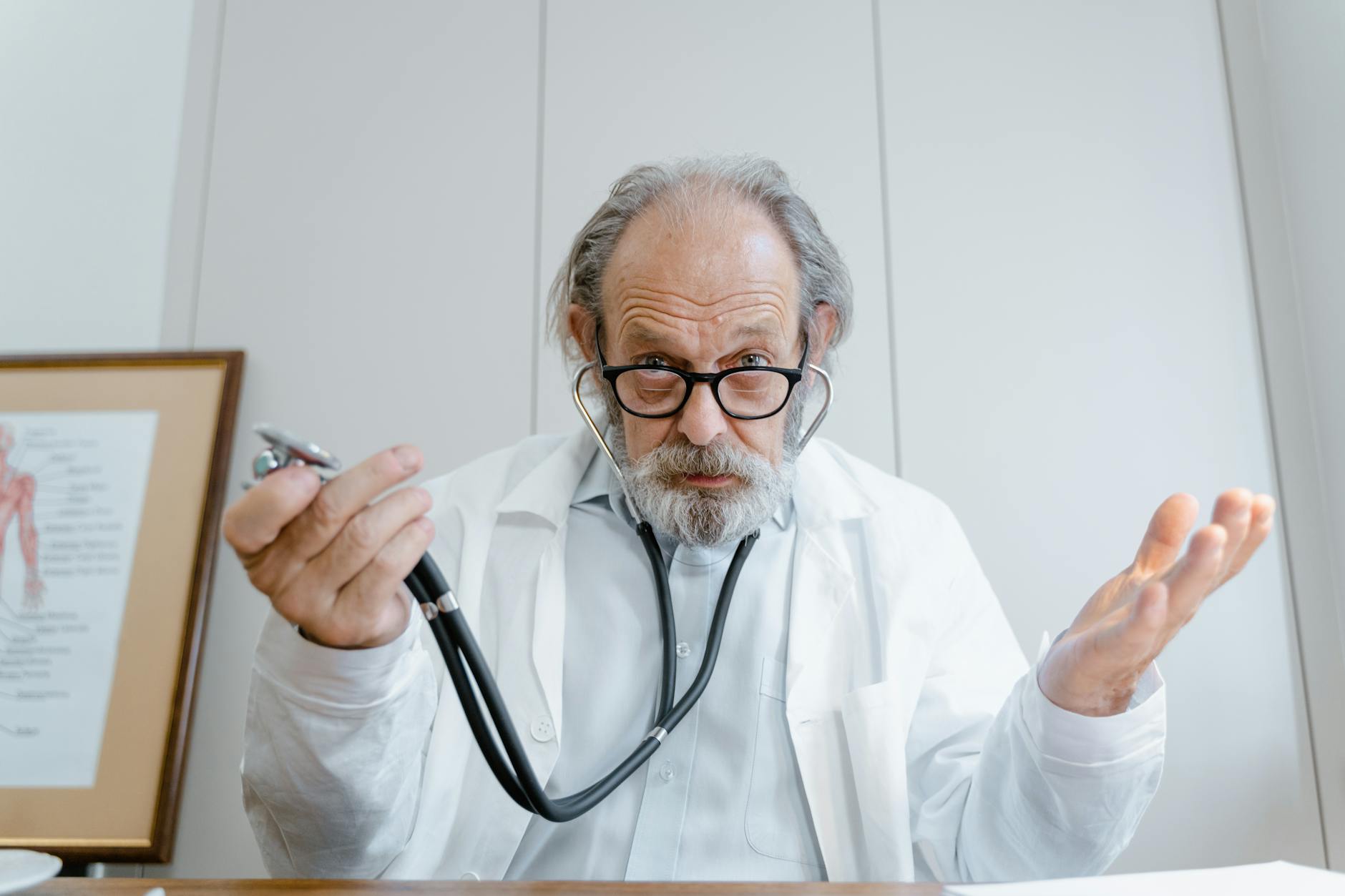 Consultant cardiologist reviewing medico-legal records