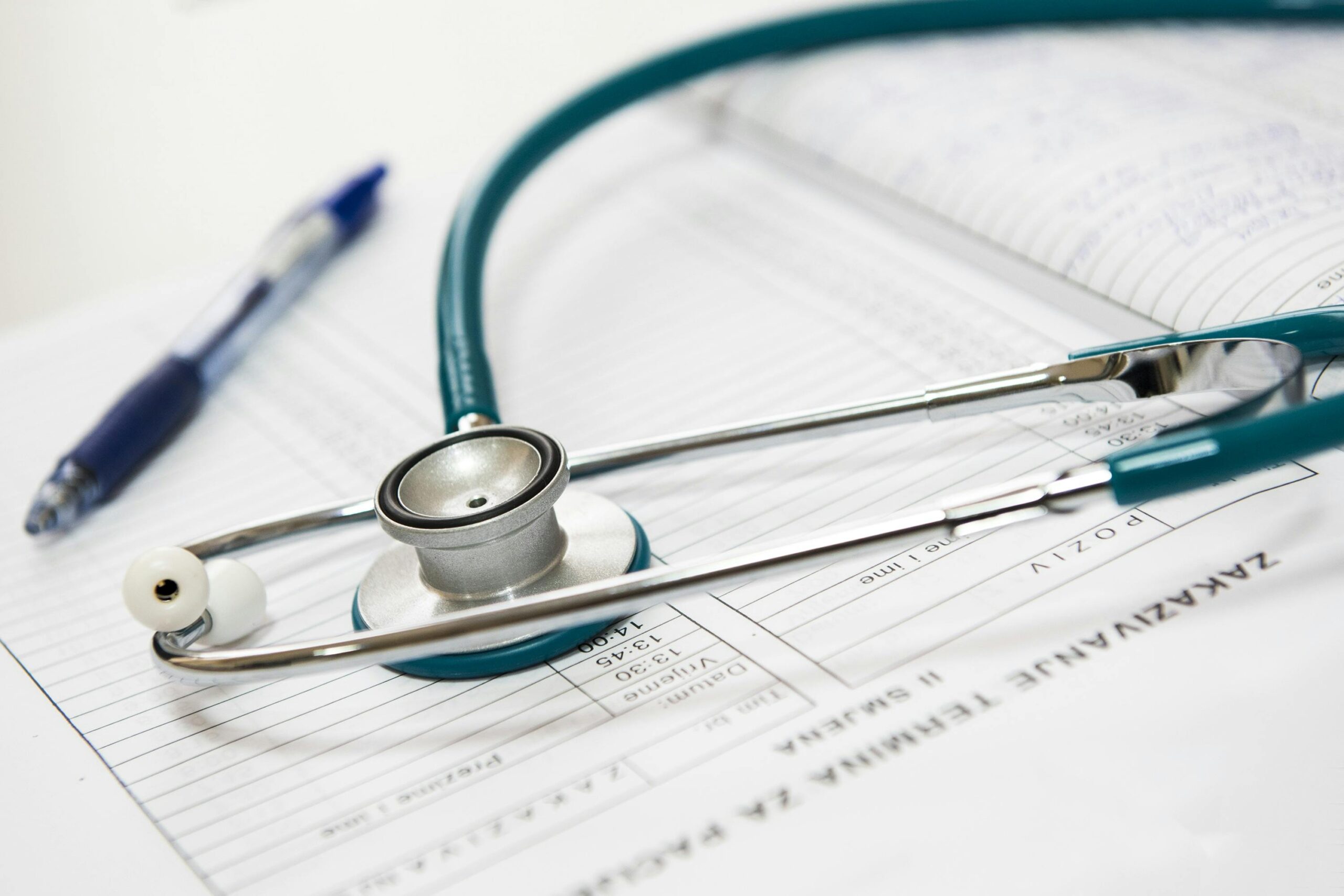 stethoscope on top of a cardiology medicolegal report