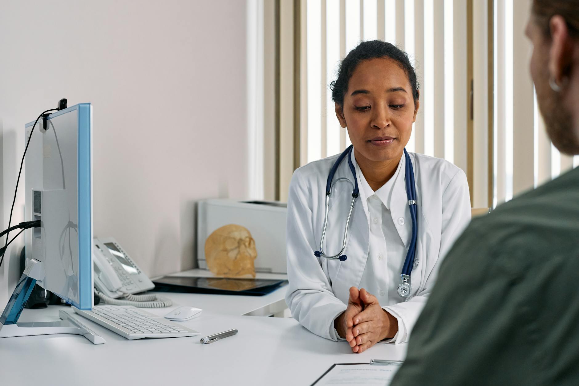 Consultant cardiologist reviewing a CPR Part 35 report structure